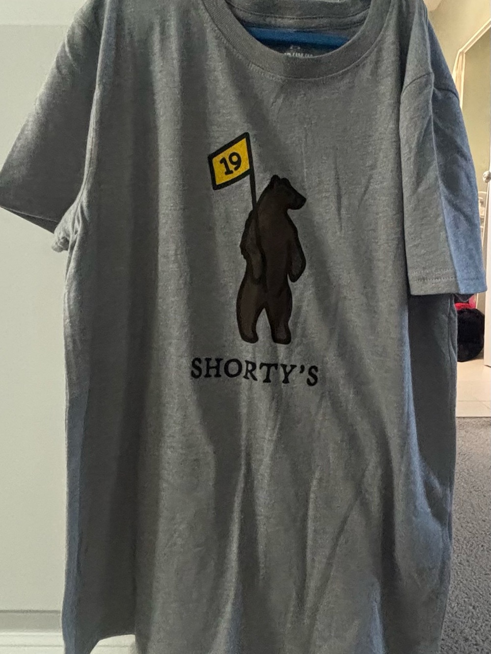 Under Armour Gray Shorty's Bear Graphic Tee with Yellow Flag